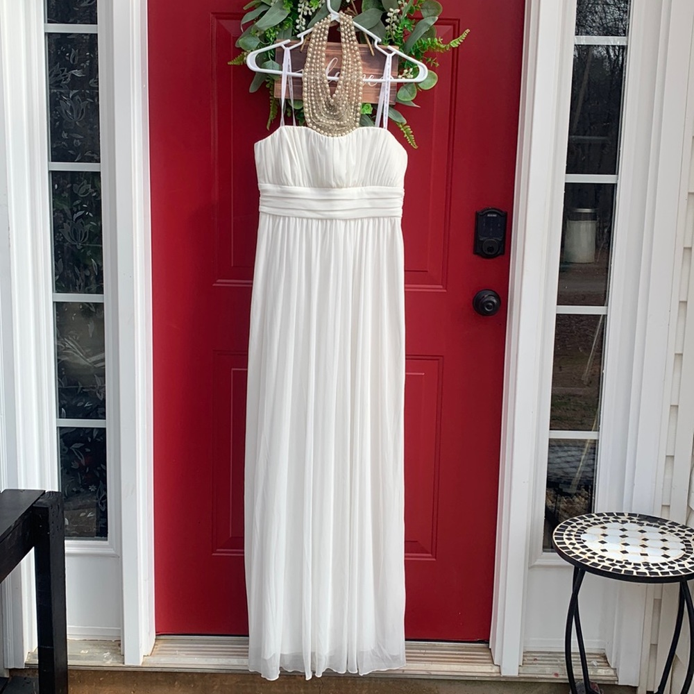 Simple wedding dress with beaded neckline accent
